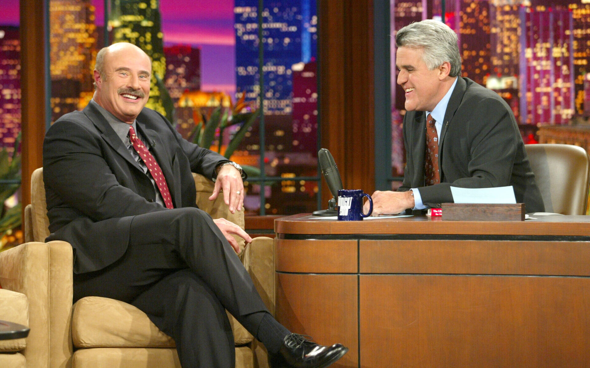BURBANK, CA - OCTOBER 30: Talk show host Dr. Phil McGraw appears on "The Tonight Show with Jay Leno" at the NBC Studios on October 30, 2003 in Burbank, California. (Photo by Kevin Winter/Getty Images)