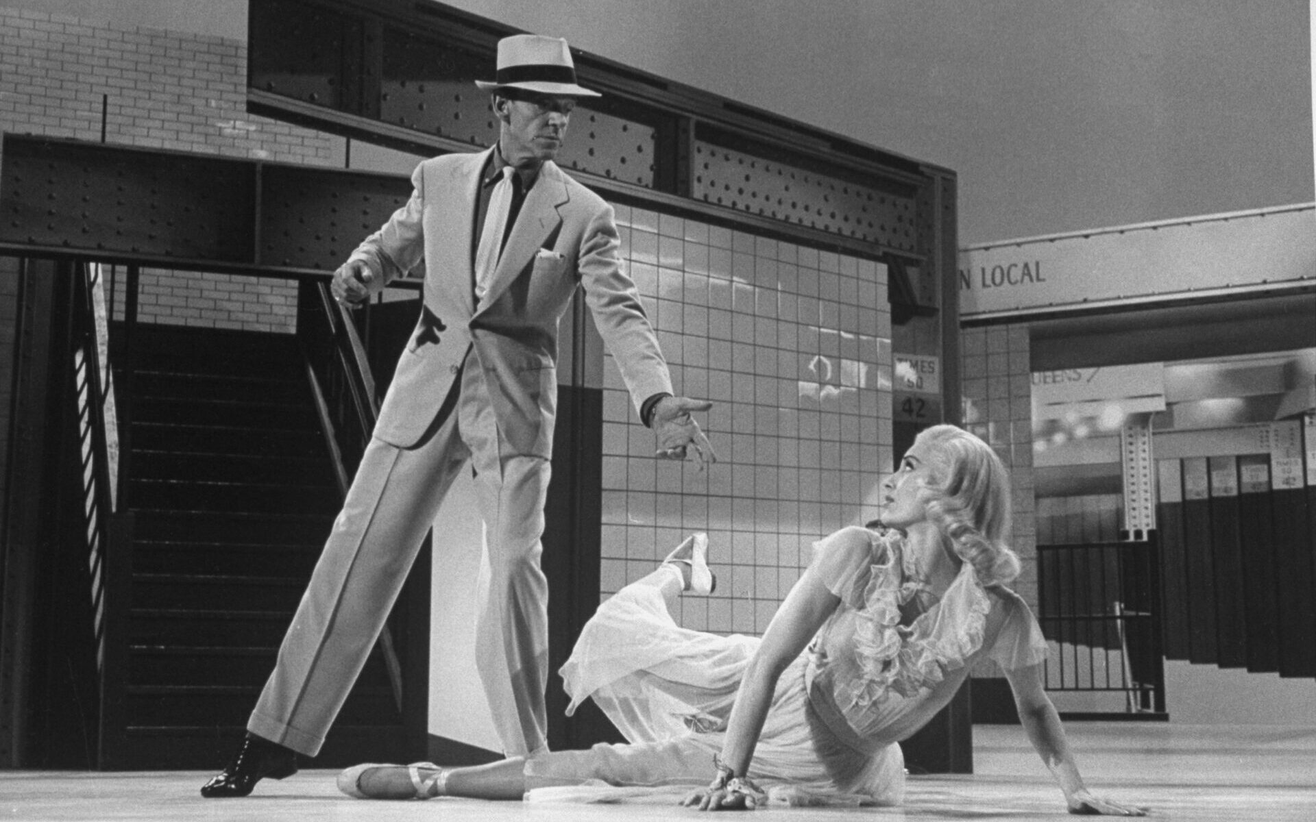 Fred Astaire dancing with chiffon-clothed and blonde-wigged Cyd Charisse in subway scene from The Band Wagon. (Photo by John Swope/Getty Images)