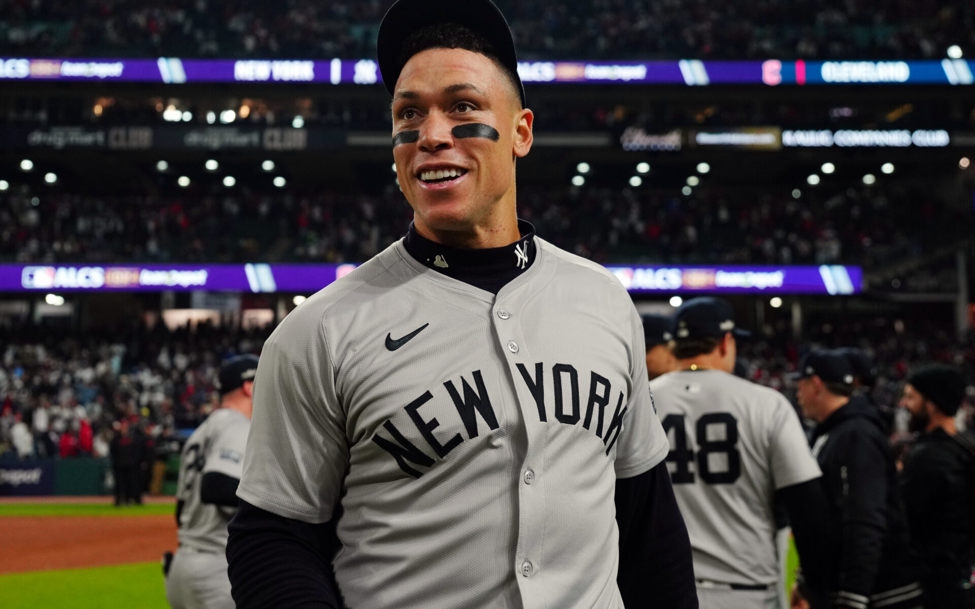 CLEVELAND, OH - OCTOBER 19: Aaron Judge #99 of the New York Yankees celebrates on the field after defeating the Cleveland Guardians in Game 5 of the ALCS presented by loanDepot to advance to the 2024 Major League Baseball World Series at Progressive Field on Saturday, October 19, 2024 in Cleveland, Ohio. (Photo by Mary DeCicco/MLB Photos via Getty Images)